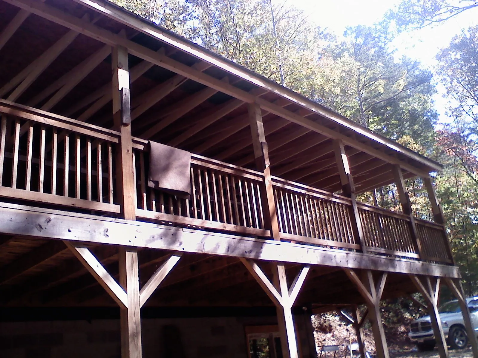 Timber framing under a new elevated porch and deck — Roof Leak Repair in Cullowhee by Roofing Brothers